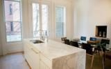 brownstone, contemporary, light, white, fireplace, kitchen, deck, 